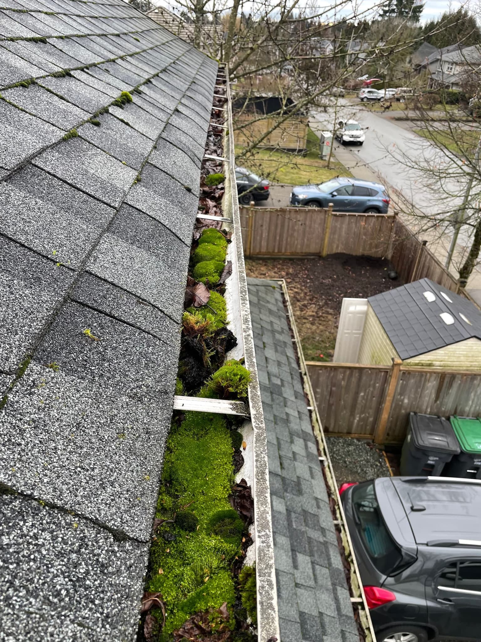 Before: debris-filled gutter section